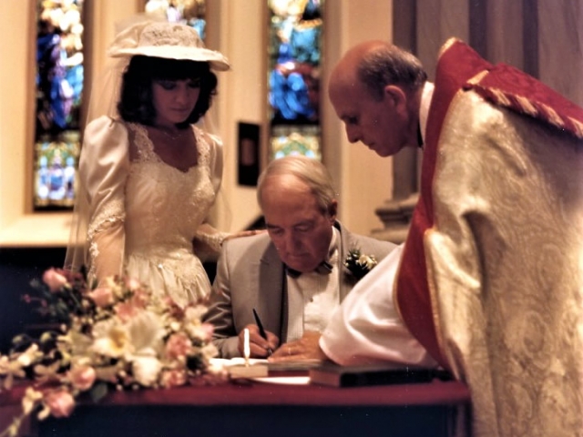 Douglas and Kimberley Reeman with Father David Bousfield.